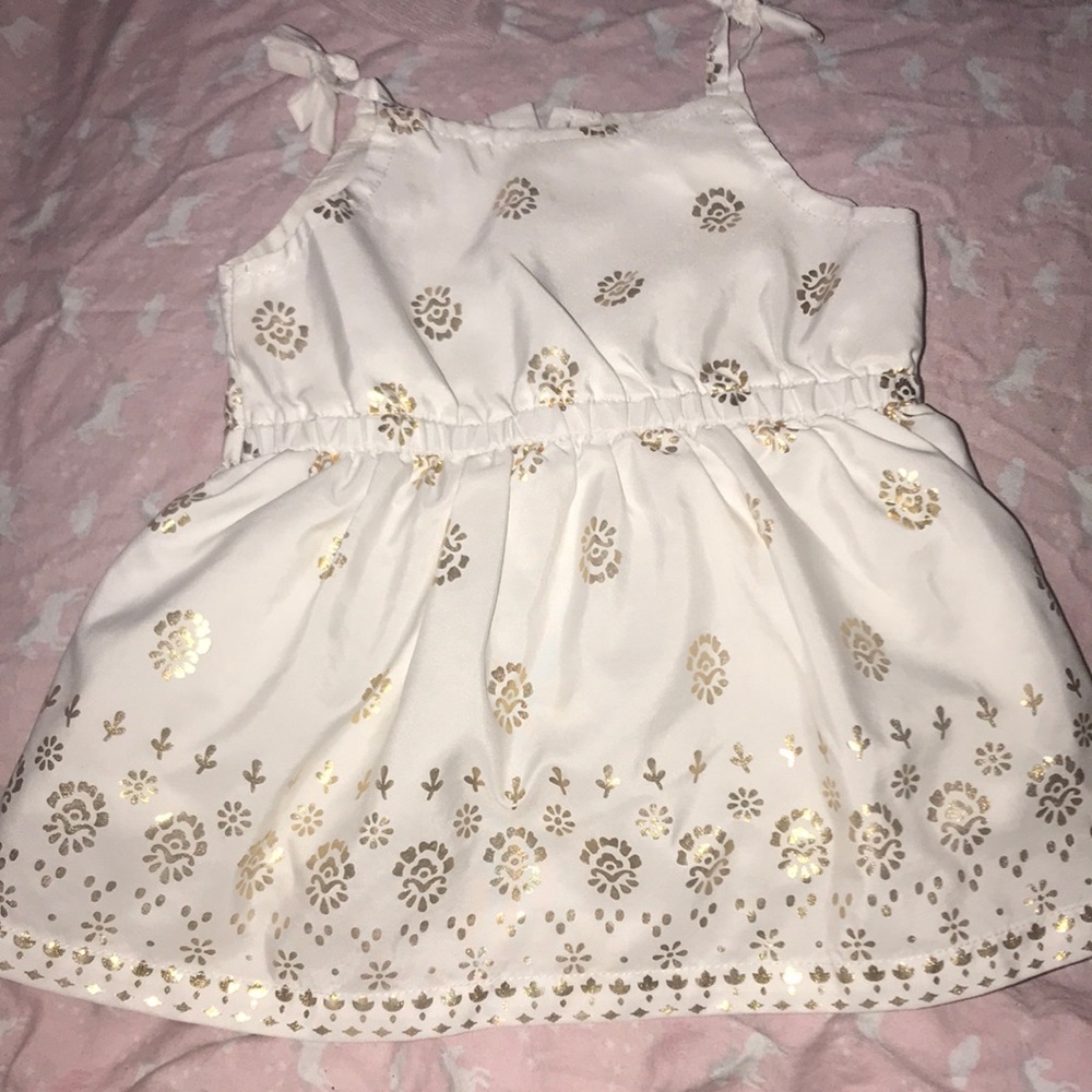 Baby shirt, white with gold design. 3 months